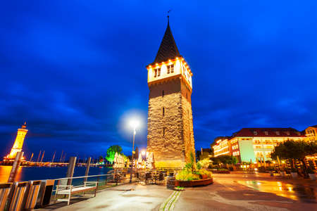Mangturm or Mangenturm is an ancient tower in Lindau old town at night. Lindau is a major town and island on the Lake Constance or Bodensee in Bavaria, Germany.の写真素材