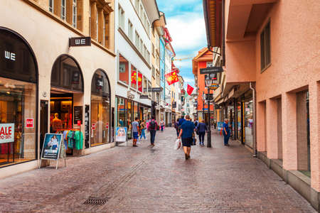 LUZERN, SWITZERLAND - JULY 12, 2019: Street with colorful local style houses in Lucerne. Lucerne or Luzern is a city in central Switzerland.のeditorial素材