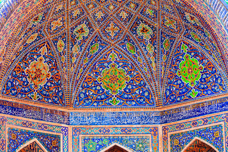 Registan mosaic pattern design background of ceramic tiles of Registan madrasah in Samarkand city, Uzbekistanの写真素材