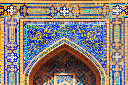 Registan mosaic pattern design background of ceramic tiles of Registan madrasah in Samarkand city, Uzbekistanの写真素材