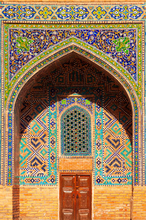 Registan mosaic pattern design background of ceramic tiles of Registan madrasah in Samarkand city, Uzbekistanの写真素材