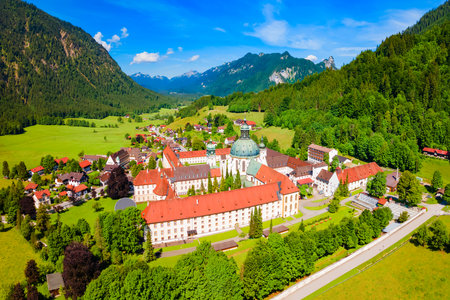 Ettal Abbey aerial panoramic view. Ettal Abbey is a Benedictine monastery in the village of Ettal close to Oberammergau and Garmisch-Partenkirchen in Bavaria, Germanyの写真素材