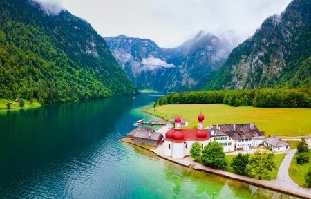 St. Bartholomew or St. Bartholomae aerial panoramic view, a roman catholic church at the Konigssee Lake in Bavaria, Germanyの写真素材