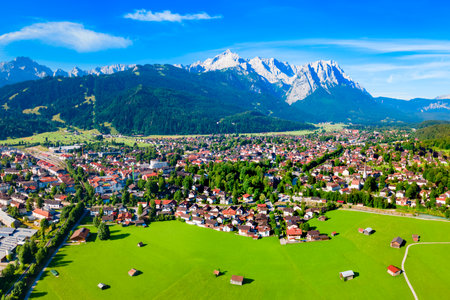 Garmisch-partenkirchen and Zugspitze mountain aerial panoramic view. Garmisch Partenkirchen is an Alpine ski town in Bavaria, southern Germany.の写真素材