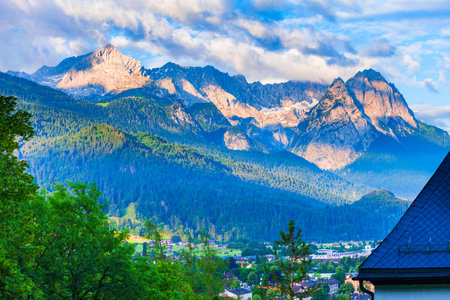 Zugspitze and Alpspitze Alps mountains aerial panoramic view from Eckenhutte viewpoint in Garmisch-partenkirchen town in Bavaria, southern Germanyの写真素材
