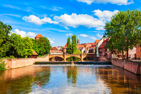 Maxbrucke or Maxbruecke is an arch bridge over the Pegnitz river in the old town of Nuremberg. Nuremberg is the second largest city of Bavaria state in Germany.の写真素材