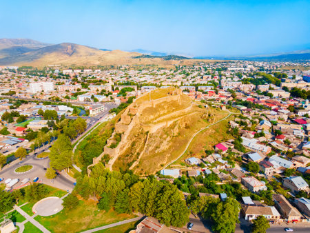 Gori Fortress or Goris Tsikhe aerial panoramic view, Georgia. It is a medieval citadel in Georgia, situated above the city of Gori on a rocky hill.の写真素材