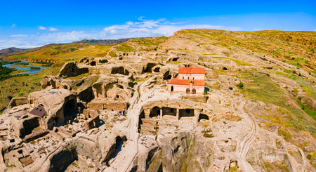 Uplistsikhe aerial panoramic view. Uplistsikhe is an ancient rock hewn town near Gori in Shida Kartli region of Georgiaの写真素材