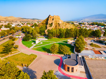 Gori Fortress or Goris Tsikhe aerial panoramic view, Georgia. It is a medieval citadel in Georgia, situated above the city of Gori on a rocky hill.の写真素材