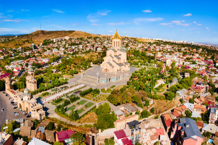 Holy Trinity Cathedral or Tsminda Sameba Church aerial panoramic view in Tbilisi old town. Tbilisi is the capital and the largest city of Georgia, lying on the banks of the Kura River.の写真素材