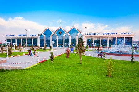 Tashkent, Uzbekistan - April 12, 2021: Yuzhny Vokzal is the main passenger railway station in Tashkent city, Uzbekistan at sunsetのeditorial素材