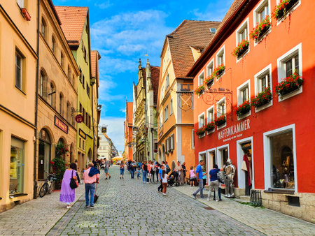 Rothenburg ob der Tauber, Germany - July 11, 2021: Obere Schmiedgasse street in Rothenburg ob der Tauber old town. Rothenburg ob der Tauber is a city in the region of Bavaria, Germany.のeditorial素材