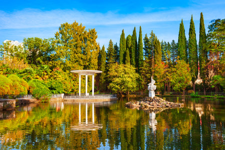 Rotunda near pond in Sochi Arboretum park, a unique collection of subtropical flora and fauna in Sochi resort city in Krasnodar Krai, Russiaの写真素材