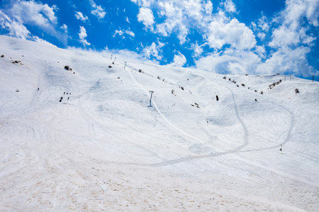 Ski slope at the Beldersay Mountain in Chimgan region of the Tian Shan mountain range near Taskent city in Uzbekistanの写真素材