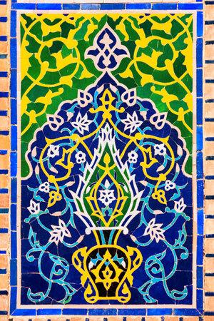 Registan mosaic pattern design background of ceramic tiles of Registan madrasah in Samarkand city, Uzbekistanの写真素材