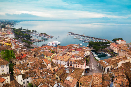 Desenzano del Garda port aerial panoramic view. Desenzano is a town on the shore of Lake Garda in the Brescia province in Lombardy, Italy.の写真素材