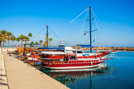 Boats at the pier in Side town, situated in Antalya region on the southern Mediterranean coast of Turkey.の写真素材