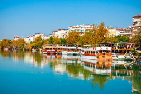Tourist cruise boat at Manavgat river in Manavgat city centre in Antalya region in Turkeyの写真素材