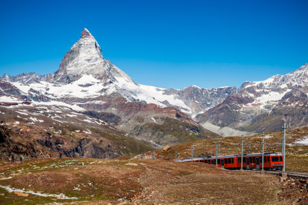 Train near the Gornergrat Bahn Railway, a mountain rack railway near Zermatt town in the Valais canton of Switzerlandの写真素材