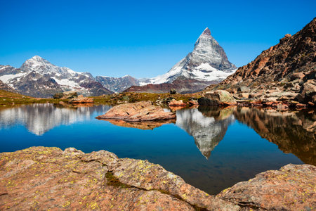 Riffelsee lake and Matterhorn mountain in the Alps, located between Switzerland and Italyの写真素材