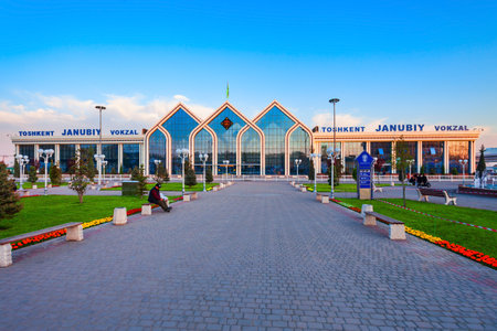 Tashkent, Uzbekistan - April 12, 2021: Yuzhny Vokzal is the main passenger railway station in Tashkent city, Uzbekistan at sunsetのeditorial素材