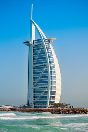 DUBAI, UAE - FEBRUARY 27, 2019: Burj Al Arab luxury hotel and Jumeirah public beach in Dubai city in UAEのeditorial素材
