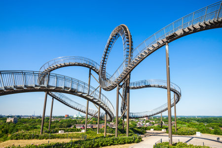 DUISBURG, GERMANY - JULY 03, 2018: Tiger and Turtle or Magic Mountain is an art installation and landmark in Angerpark, Duisburg city in Germanyのeditorial素材