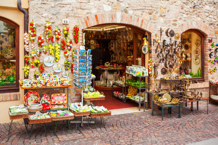 SIRMIONE, ITALY - APRIL 12, 2019: Souvenir shop in the Sirmione town which located at the Garda lake in Italyのeditorial素材