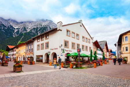 Mittenwald, Germany - July 01, 2021: Beauty local houses in Mittenwald old town in Bavaria, Germanyのeditorial素材