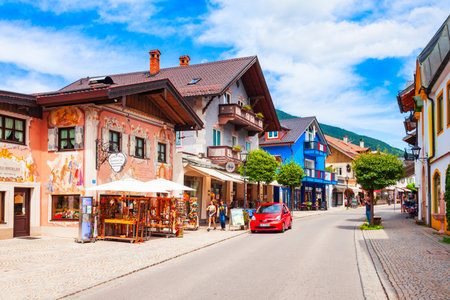 Oberammergau, Germany - July 03, 2021: Beauty houses with luftlmalerei bayern art form of house facade painting in Oberammergau town in Bavaria, Germanyのeditorial素材
