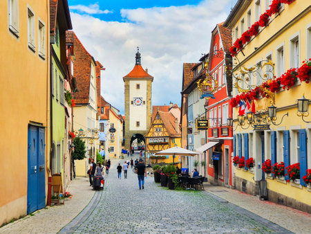 Rothenburg ob der Tauber, Germany - July 11, 2021: Plonlein square and Siebersturm Tower in Rothenburg ob der Tauber old town. Rothenburg Tauber is a city in Bavaria, Germany.のeditorial素材
