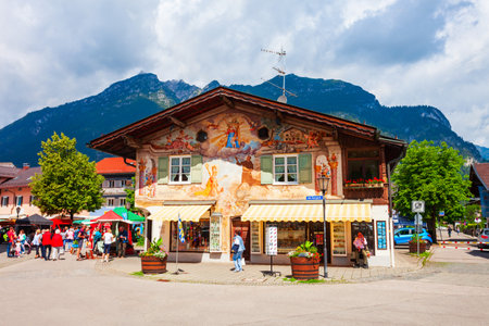 Garmisch-Partenkirchen, Germany - July 02, 2021: Beauty house with Luftlmalerei, bayern art form of facade painting in the centre of Garmisch Partenkirchen town in Bavaria, southern Germanyのeditorial素材