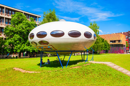 Munich, Germany - July 06, 2021: Futuro House or Futuro Pod is a round house located neat the Pinakothek der Moderne, a modern art museum in Munichのeditorial素材