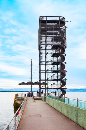 Friedrichshafen, Germany - July 05, 2021: Aussichtsturm or Moleturm is an observation tower, marks the entrance to the harbor of Friedrichshafen on Lake Constanceのeditorial素材