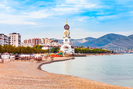 City beach and Church of the Holy Prince Peter and Princess Fevronia in Novorossiysk city. Novorossiysk is the main port on the Black Sea in Krasnodar Krai, Russia.のeditorial素材