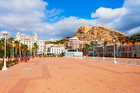 Port square and Santa Barbara Castle on background. Santa Barbara Castle is a fort stands on Mount Benacantil in the center of Alicante, Spain.のeditorial素材