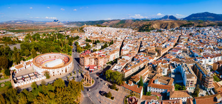 Plaza de Castilla Square and Puerta de Estepa Gate aerial panoramic view in Antequera. Antequera is a city in the province of Malaga, the community of Andalusia in Spain.のeditorial素材