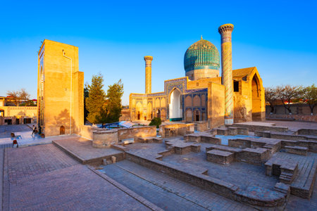 Guri Amir or Gur Emir is a mausoleum of the Mongol conqueror Amir Temur or Tamerlane in Samarkand, Uzbekistan at sunsetのeditorial素材