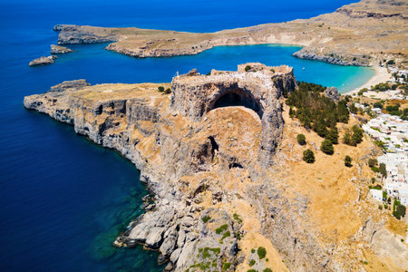 Saint Paul's Beach and Lindos Acropolis aerial panoramic view in Rhodes island in Greeceのeditorial素材