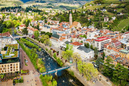 Merano city centre aerial panoramic view. Merano or Meran is a town in South Tyrol in northern Italy.のeditorial素材