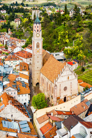 St. Nicholas Church aerial panoramic view in Merano. Merano or Meran is a town in South Tyrol in northern Italy.のeditorial素材