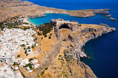 Saint Paul's Beach and Lindos Acropolis aerial panoramic view in Rhodes island in Greeceのeditorial素材