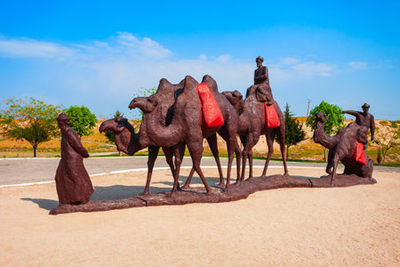 Cameleer amd camels monument at the Afrasiab Museum of Samarkand, a museum located at the historical site of Afrasiyabのeditorial素材