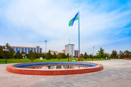 National flag of Uzbekistan in Kuksaray Square. Kuksaray Square is one of the largest squares in Samarkand and Uzbekistan.のeditorial素材