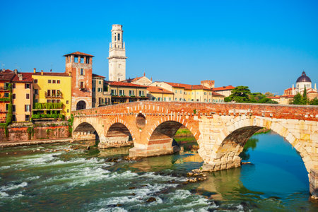 Ponte Pietra bridge is a Roman arch stone bridge crossing the Adige River in Verona, Veneto region in Italyの写真素材