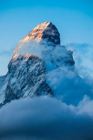 Matterhorn mountain range of the Alps, located between Switzerland and Italy at sunsetの写真素材