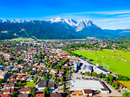 Garmisch-partenkirchen and Zugspitze mountain aerial panoramic view. Garmisch Partenkirchen is an Alpine ski town in Bavaria, southern Germany.の写真素材