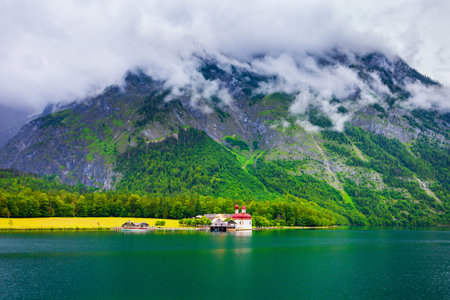 St. Bartholomew or St. Bartholomae is a roman catholic church at the Konigssee Lake in Bavaria, Germanyの写真素材