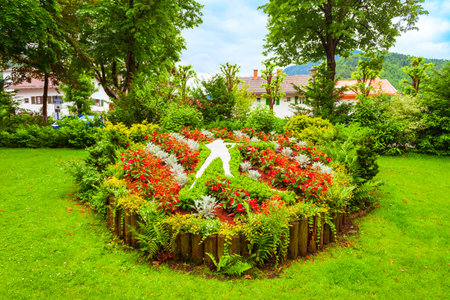Beauty flower garden at the public park in Mittenwald old town in Bavaria, Germanyの写真素材