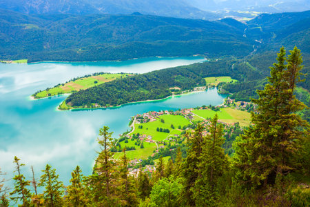 Walchensee aerial panoramic view from Herzogstand viewpoint. Walchensee or Lake Walchen is one of the deepest and largest alpine lakes in Germany.の写真素材
